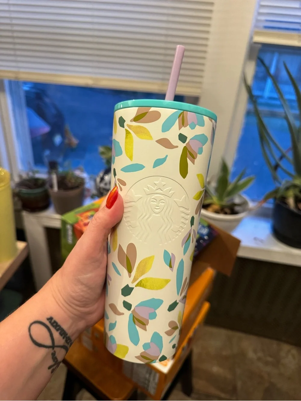 Starbucks White Floral Tumbler with Pastel Leaves and Teal Rim